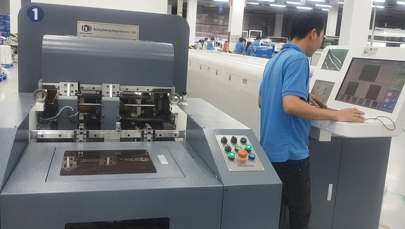 Công nhân Công ty Cổ phần in và  bao bì Goldsun làm việc trong KCN Quế Võ, tỉnh Bắc Ninh Công nhân Công ty Cổ phần in và  bao bì Goldsun làm việc trong KCN Quế Võ, tỉnh Bắc Ninh